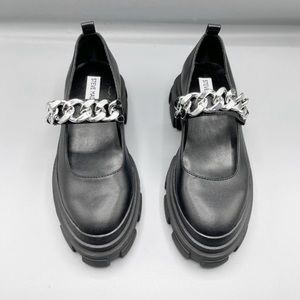 Size 6 black Mary jane platform with silver chain details. Never worn(too big)